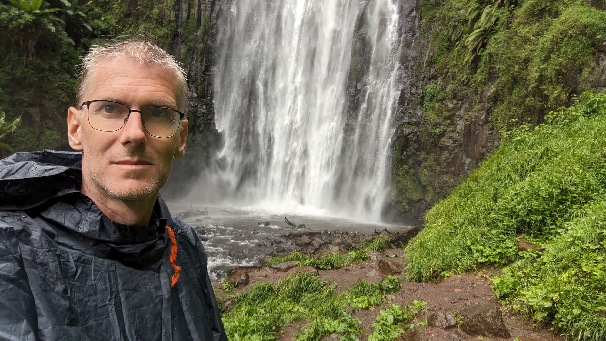 A Rainy Adventure on Kilimanjaro: Hiking to the Majestic Waterfall image